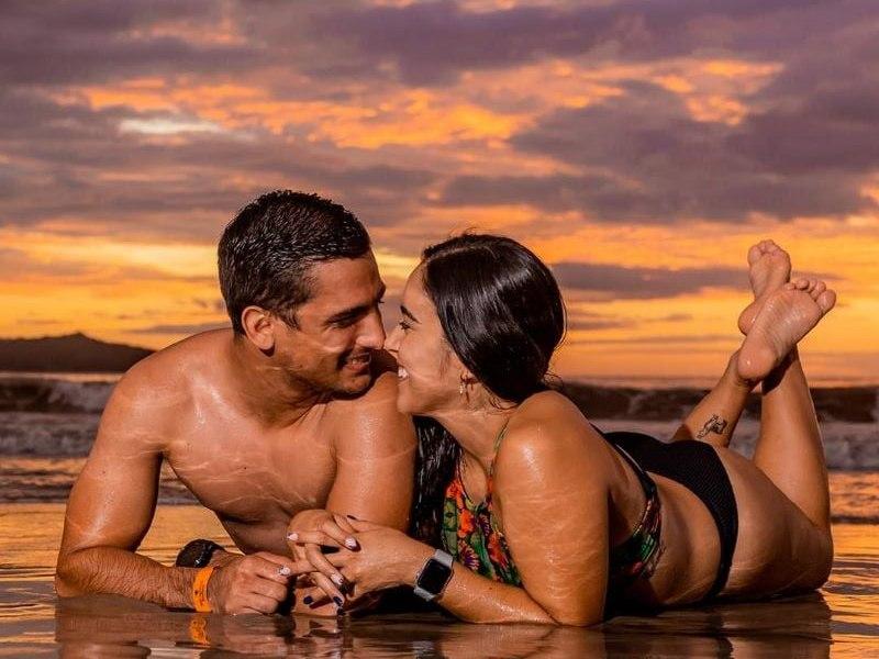 Couple on the beach at sunset